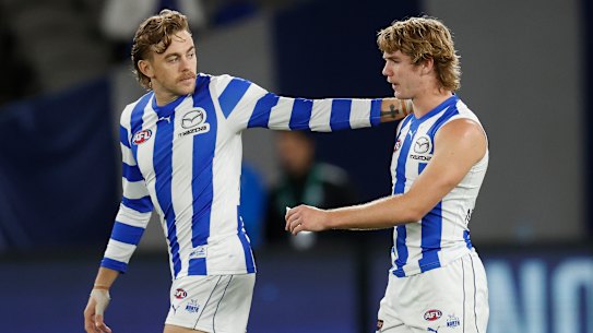 Hugh Greenwood consoles Jason Horne-Francis after another North Melbourne loss.