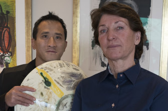 Marina Picasso, right, granddaughter of artist Pablo Picasso, and her son Florian Picasso with a ceramic Picasso artwork in Geneva this week. 