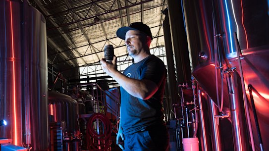 Dan Dainton in his  Carrum Downs brewery with some of his Low-alcohol and alcohol-free beer.