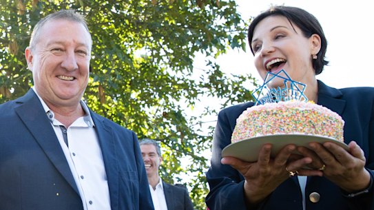 NSW Labor Leader Jodi McKay presents Upper Hunter NSW Labor candidate, Jeff Drayton, with a birthday cake in Singleton on Tuesday.