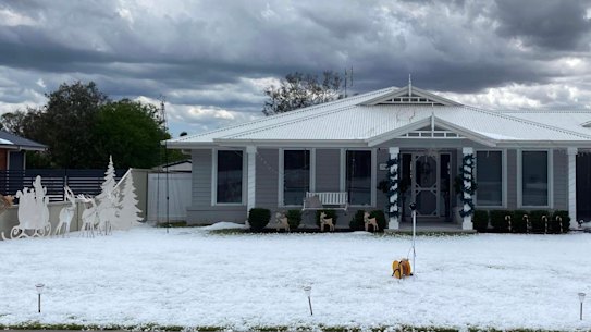 A lawn in Grenfell, south of Orange, is covered in white after hail stones larger than golf balls hit parts of central NSW on Monday.