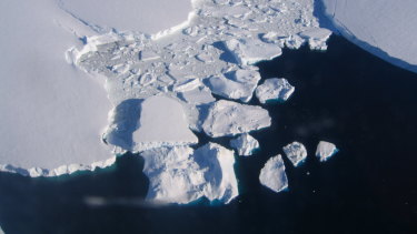 Sea ice is breaking apart and melting because of human-induced climate change.