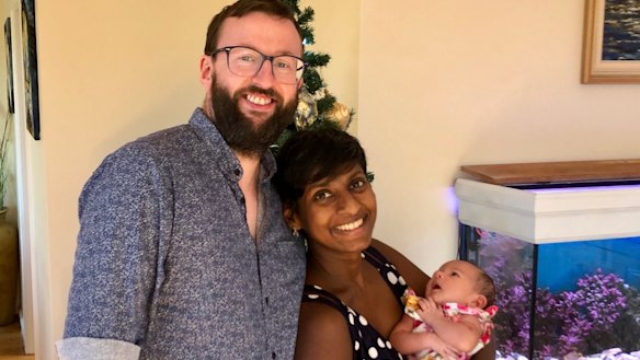 Kevin and Manu O'Connor with their baby Sita at their Croydon home.