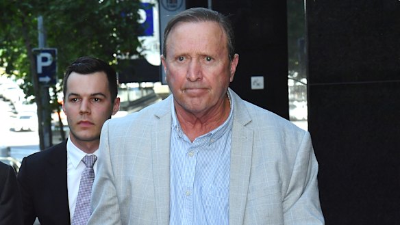 Geoff Ablett leaves after giving evidence to the anti-corruption hearings examining the Casey land deals scandal.