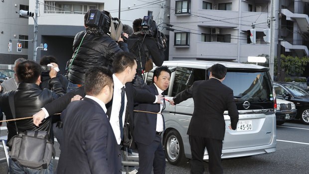 The silver van that was said to be carrying Ghosn.