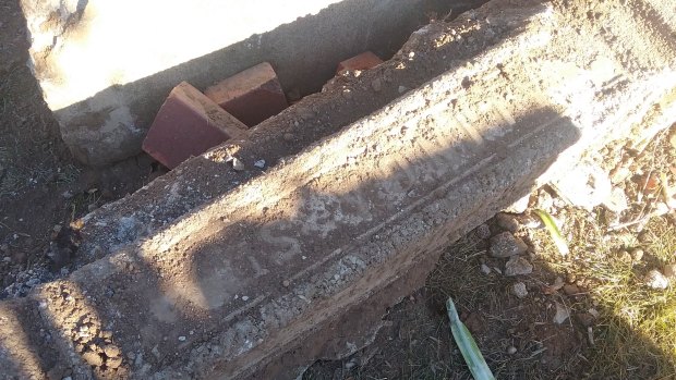 One of the old street markers uncovered in a Narrabundah front yard.