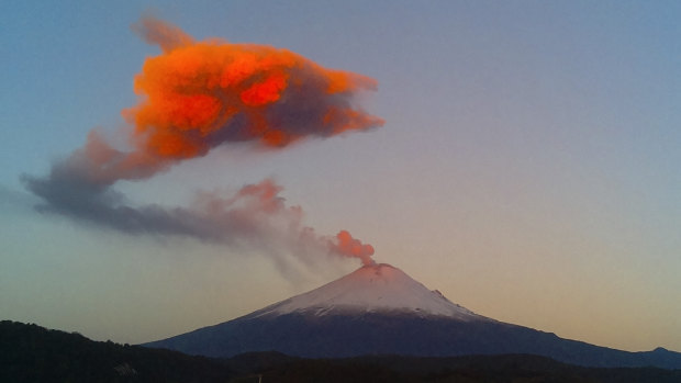 Ash and steam rise from the crater of the Popocatepetl volcano, seen from the town of San Nicolas de los Ranchos, Mexico, in 2015.