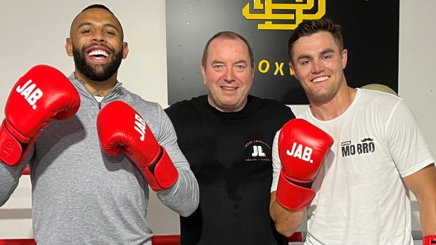 Bulldogs winger Josh Addo-Carr, Paul Gallen’s boxing trainer Graham Shaw and Canterbury halfback Kyle Flanagan after a boxing session.