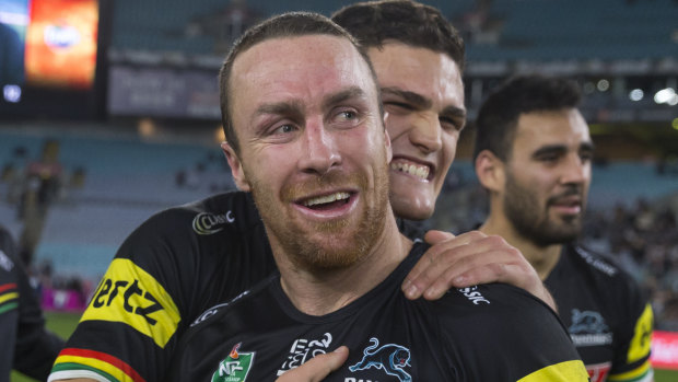 Linchpins: Nathan Cleary hugs James Maloney after full-time.
