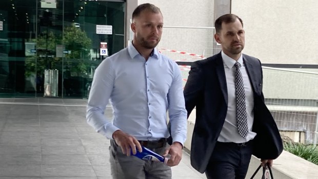 Brendan Sipple (left) leaves Brisbane Magistrates Court on Tuesday with lawyer Jason Grant (right).