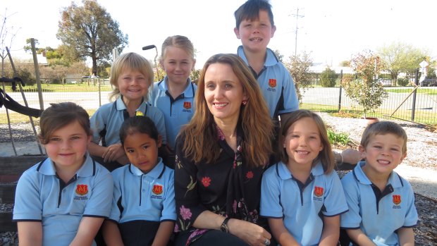 Moulemain Public School principal Jennie Wilson with some of the school's students.