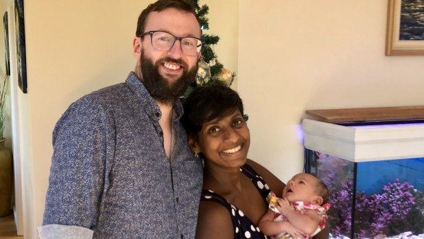 Kevin and Manu O'Connor with their baby Sita at their Croydon home.