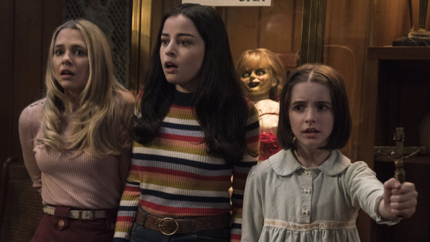 Madison Iseman (left), Katie Sarife and McKenna Grace in Annabelle Comes Home.