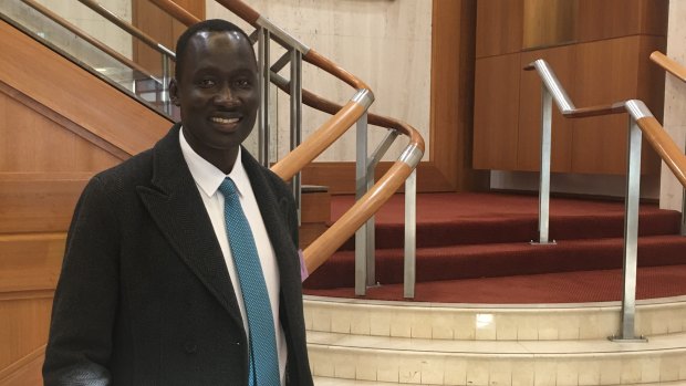 Queensland African Communities Council president Beny Bol at Parliament House.
