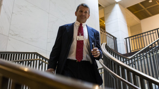 Erik Prince walks to a House Intelligence Committee hearing on Capitol Hill last year. These days he's been spotted lobbying in Afghanistan.