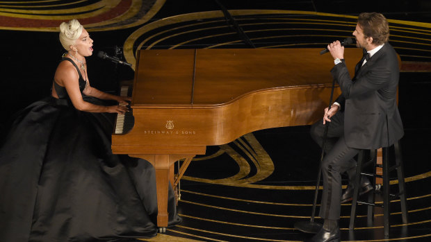 Lady Gaga and Bradley Cooper perform Shallow from A Star Is Born at the 2019 Oscars.