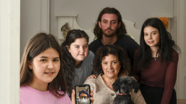 Nicole Cullinan, her 4 children from LEFT TO RIGHT Sophie 19 years old, Faith 16 years old, Tom, 21 years old, Bella 23 years old and dog Frenchie at their Melbourne home