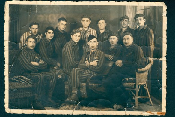 Phillip (at top row, far left) with the Balingen garage crew in May 1945, shortly after liberation and still wearing their prison camp uniforms. 