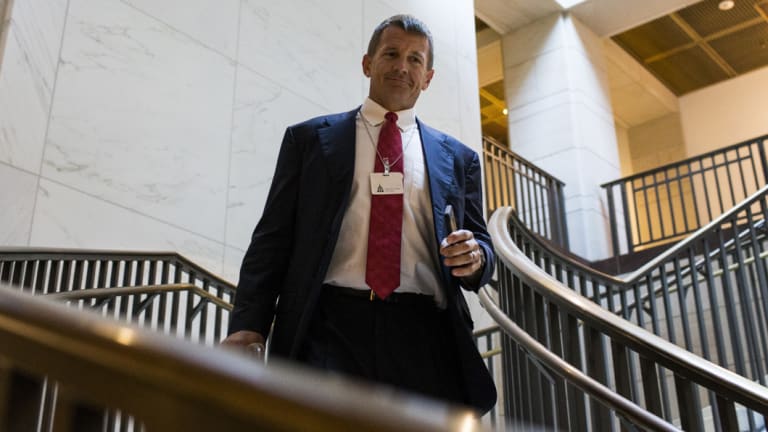 Erik Prince walks to a House Intelligence Committee hearing on Capitol Hill last year. These days he's been spotted lobbying in Afghanistan.