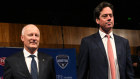 AFL Commission chairman Richard Goyder (left) and AFL CEO Gillon McLachlan arrive at the North Melbourne grand final breakfast on Saturday.