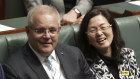 Prime Minister Scott Morrison sits with Liberal Gladys Liu during a division in the House of Representatives after Shadow Attorney-General Mark Dreyfus moved to suspend standing orders, at Parliament House in Canberra on  Thursday 12 September 2019. fedpol Photo: Alex Ellinghausen