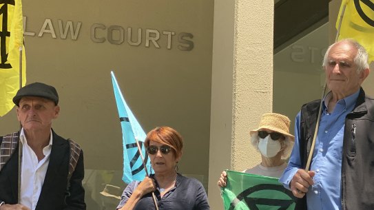 Four members of the ‘Burrup Five’ outside Perth’s Central Law Courts.