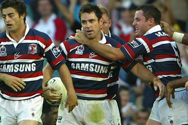 Roosters players congratulate Brad Fittler after scoring a try during the NRL round seven match between the Sydney Roosters and the St George/Illawarra Dragons played at Aussie Stadium, April 25, 2004 in Sydney, Australia. (Photo by Chris McGrath/Getty Images)
