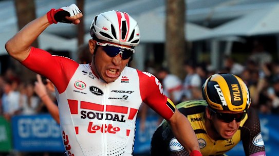 Australia's Caleb Ewan celebrates as he crosses the finish line to win the 21st stage of the Tour de France.