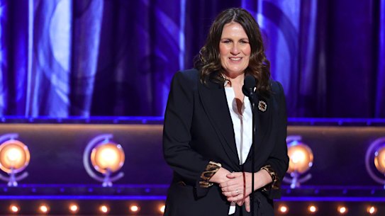 Bill Damaschke and Carmen Pavlovic accept the award for Best Musical for Moulin Rouge! The Musical.