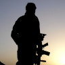 A generic photo of ADF soldier (main) and Melbourne-based academic Samantha Crompvoets (inset).