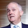 Tax cuts for companies, voters, as Turnbull snubs Canberra for Queensland