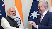 Australian Prime Minister Anthony Albanese shakes hands with India’s Prime Minister Narendra Modi in Melbourne.