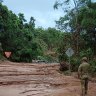 Swamped Queensland town overcomes setbacks to welcome flood evacuees