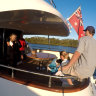 The Lady Pamela is moored at the Gold Coast City Marina while a nurse tests Hannah Fox for COVID-19 on the yacht. 