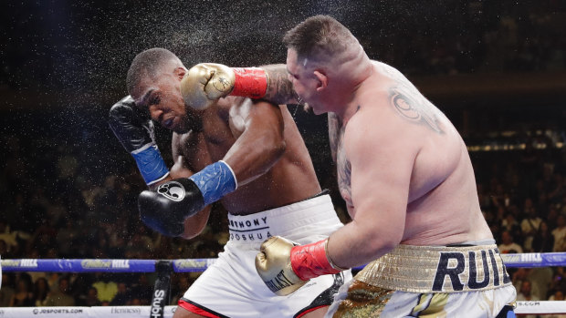 People's champion: Mexico's Andy Ruiz lands a fierce blow on Anthony Joshua at Madison Square Garden.