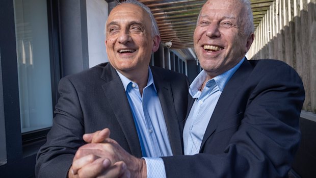 Mario Verrocchi and Jack Gance celebrate after the listing of Chemist Warehouse.