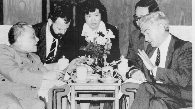 
"Mr Hawke, who swore off tobacco last Christmas, refuses a cigarette from chain-smoking Mr Deng at their meeting"