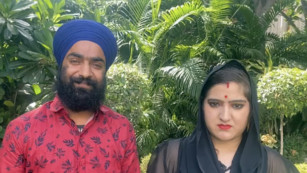 Manmeet Kour Bali, right, with her second husband in a photo provided by Manjinder Singh Sirsa, head of the largest gurudwara, or Sikh temple, in New Delhi.