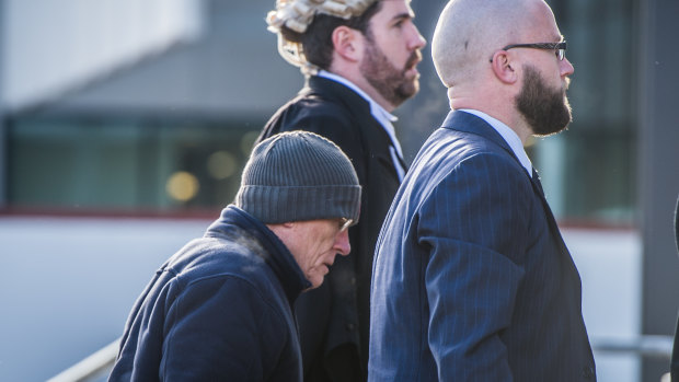 David Eastman, left, arrives at the ACT Supreme Court with his lawyers for his trial earlier this year.