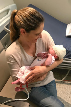 Jane McQualter cradles baby Emily in the early weeks.