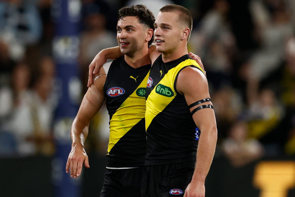 Lalor and Tim Taranto celebrate the unlikeliest of victories.