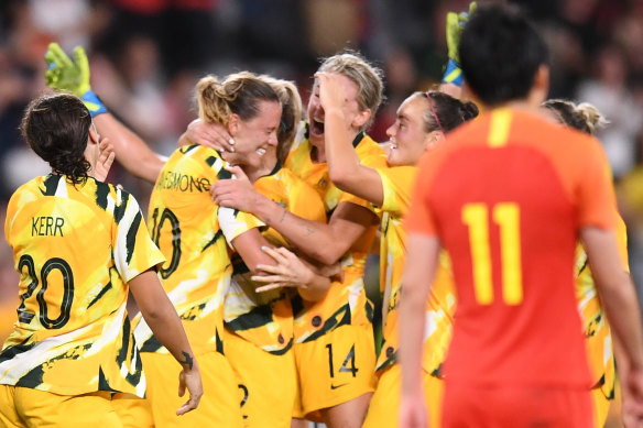 The Matildas celebrate after Emily van Egmond's equaliser against China on Thursday night.