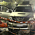 Chaos erupted at the gates of the Gold Coast 500 on Friday night after an alleged out-of-control driver ploughed into two pedestrians.