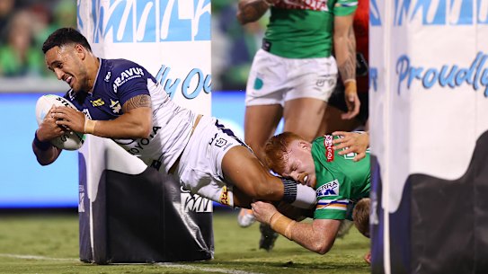 Valentine Holmes crashes over for a try in the second half.