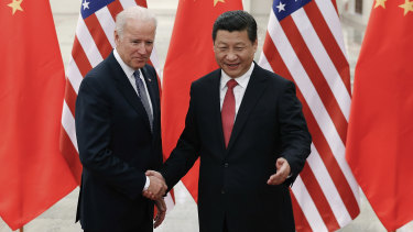 Joe Biden with Xi Jinping, pictured in 2013 when Biden was US vice-president. 