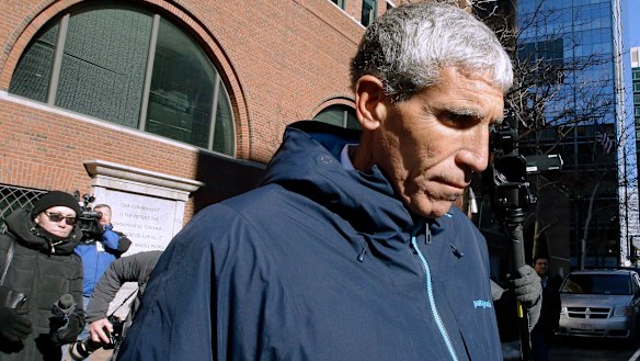 William "Rick" Singer, founder of the Edge College & Career Network, departs federal court in Boston on Tuesday after he pleaded guilty to charges in a nationwide college admissions bribery scandal. 