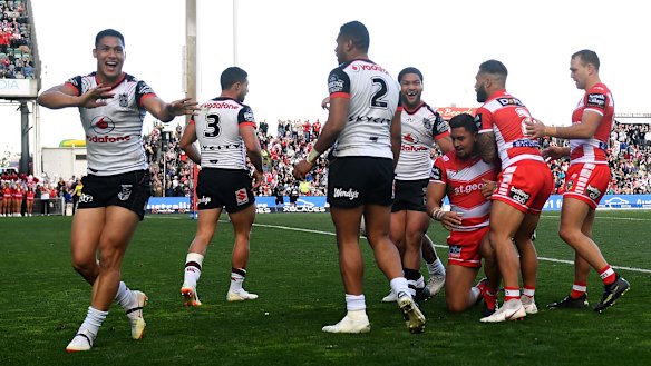 Man of the match: Roger Tuivasa-Sheck celebrates after the Dragons are denied a match-winning try in round 21.