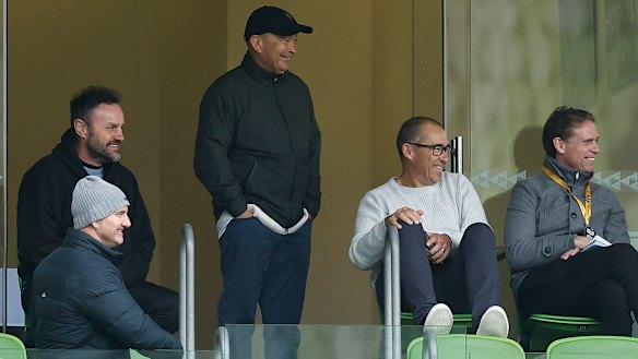 Wallabies coach Eddie Jones, centre, at AAMI Park with assistants David Rath (second from right) and Brett Hodgson (right).