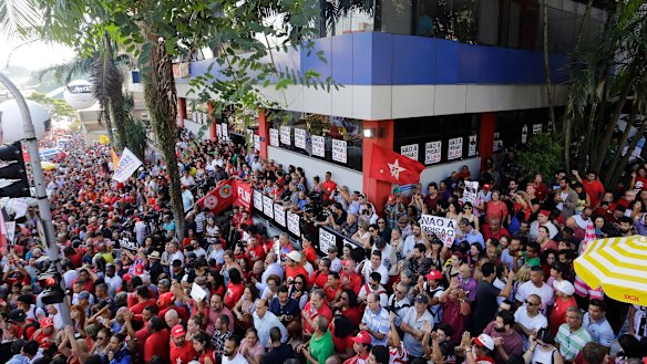 Supporters of Brazil's former President Luiz Inacio Lula da Silva gather outside the metal workers union headquarters where da Silva is hunkered down, in Sao Bernardo do Campo, Brazil.