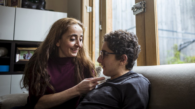 'I try to make life as normal as possible': Ms Makhoul with Christian. 